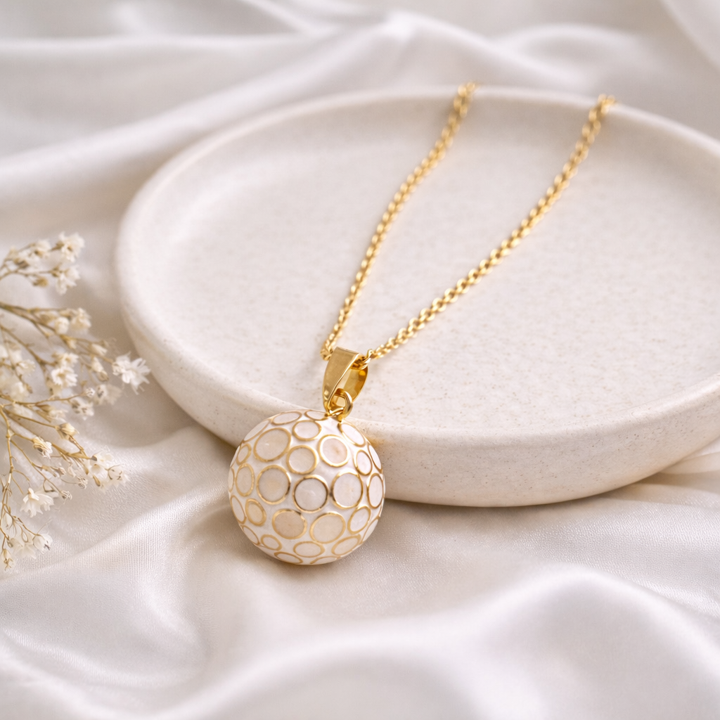 Bola de grossesse doré blanc avec motif rond