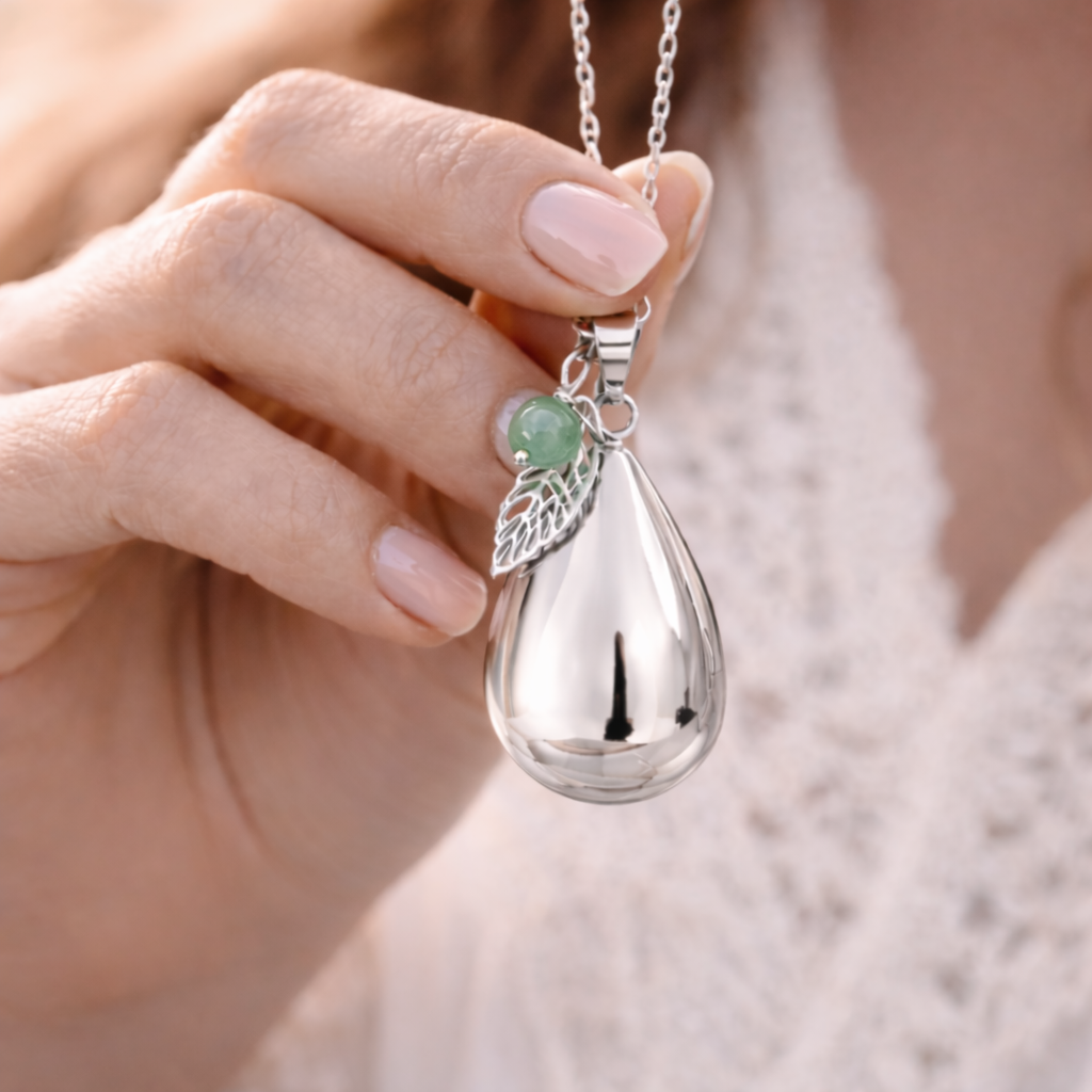 Bola de grossesse goutte argenté lisse pendentif feuille et perle aventurine