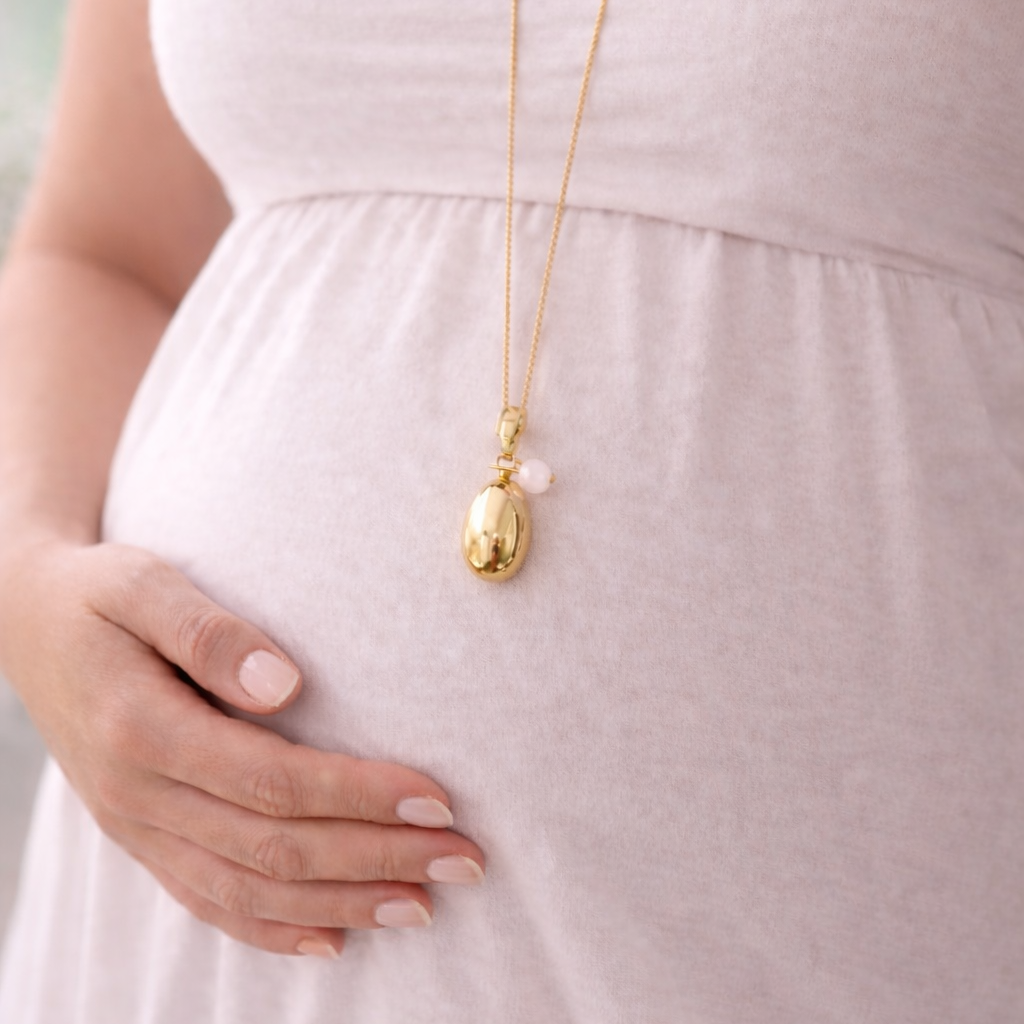Bola de grossesse ovale doré lisse perle pierre de lune