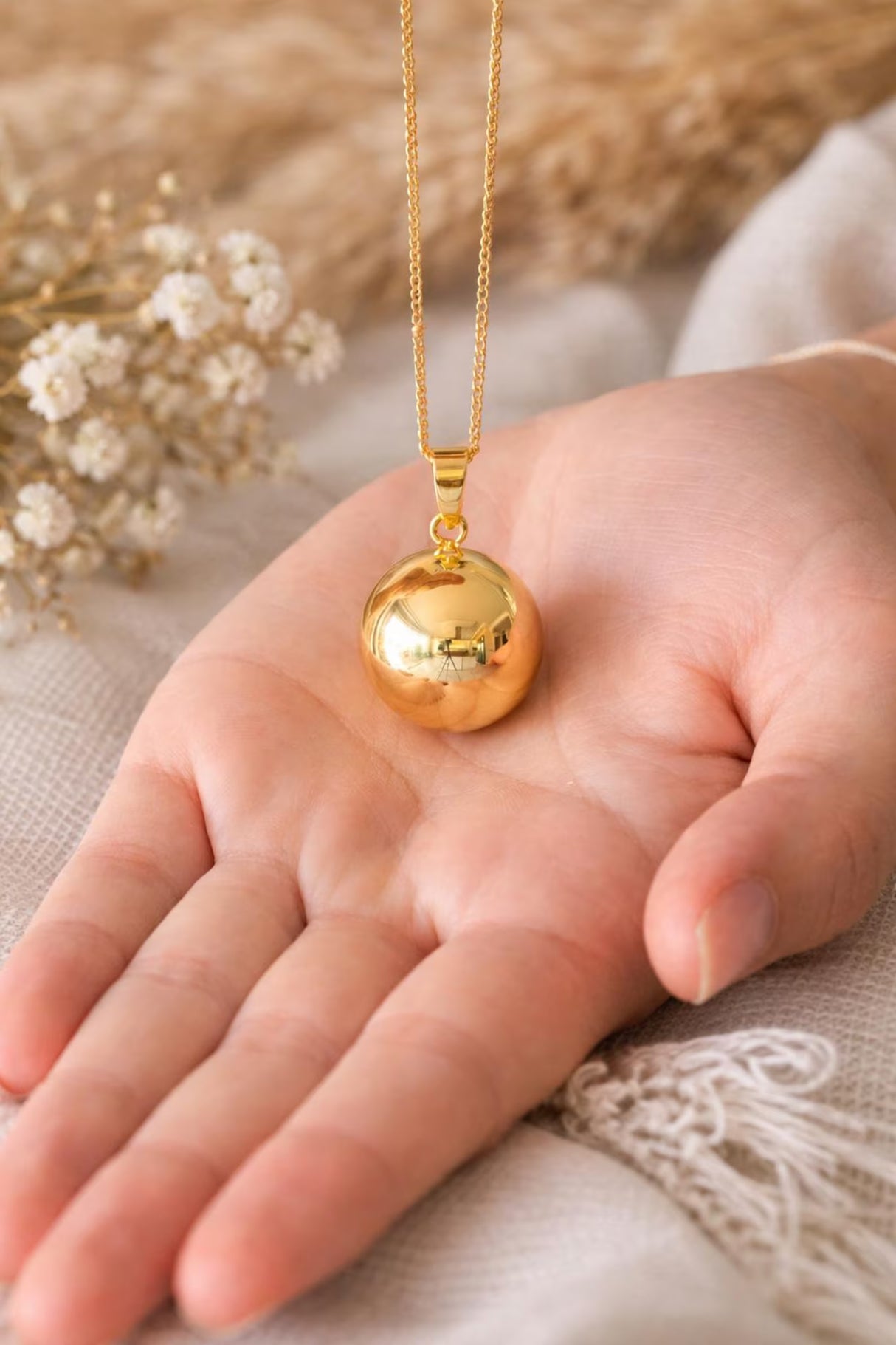 Bola de grossesse doré lisse