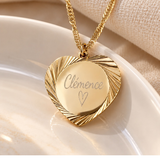 Collier personnalisé médaille gravée coeur travaillé en acier inoxydable