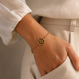 Bracelet avec médaille ronde ornée de strass en acier inoxydable