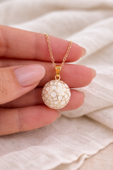 Bola de grossesse doré blanc avec motif rond