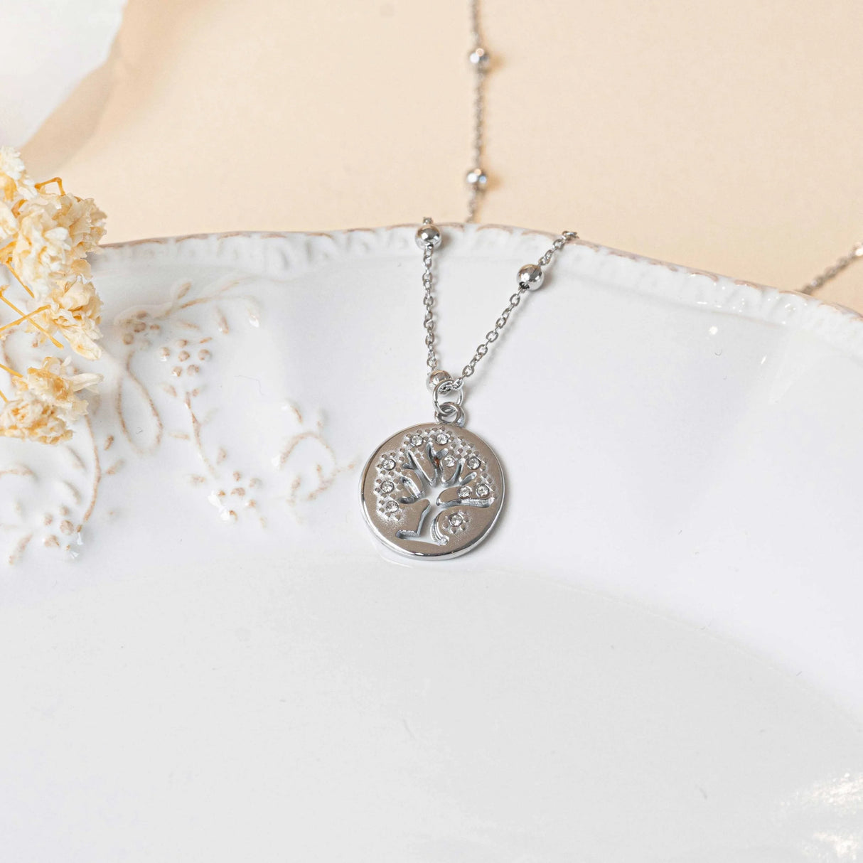 Collier arbre de vie ajouré serti d'oxydes de zirconium acier inoxydable chaine forçat femme